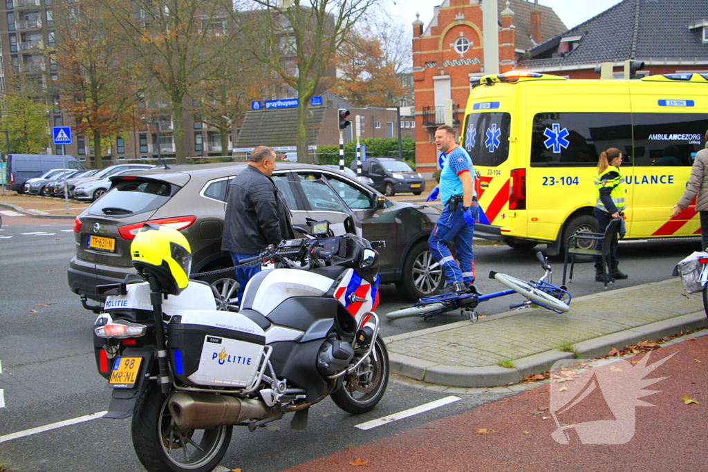 Scholier geschept door automobilist bij verkeerslicht