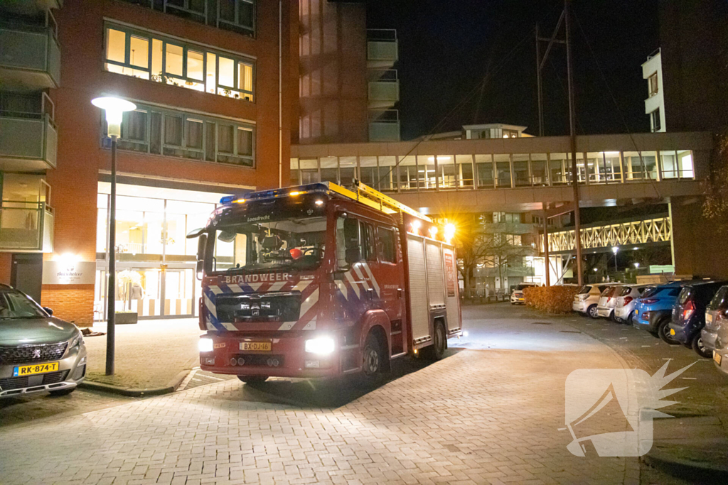 Brandend kleed zorgt voor rookontwikkeling in appartement