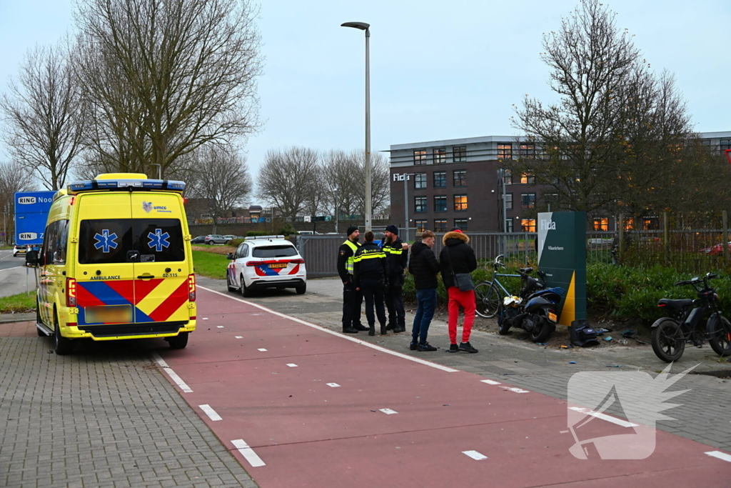 Gewonden bij ongeval tussen fietser en scooter