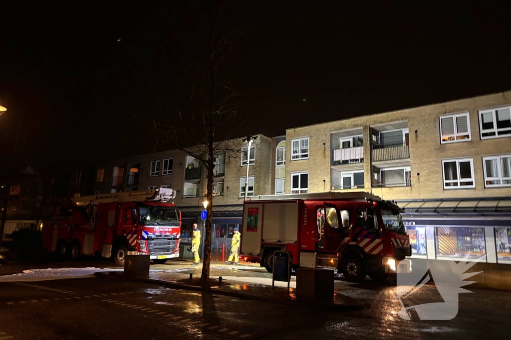 Brandweer blust brand in appartement