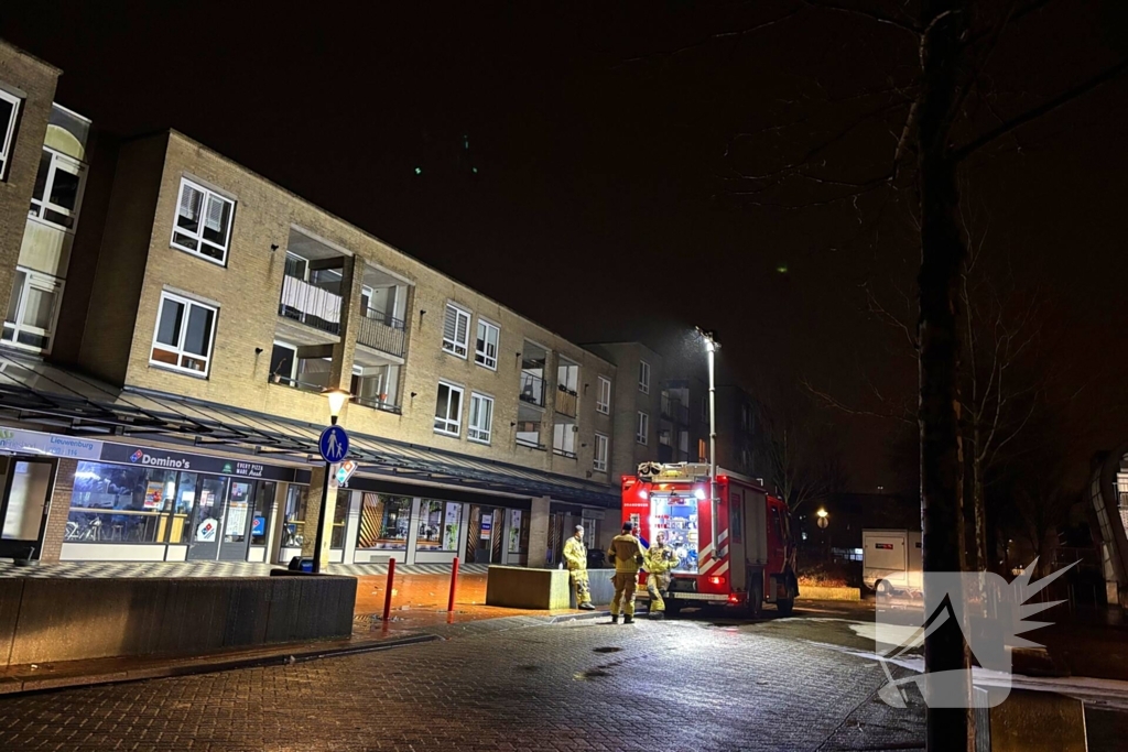 Brandweer blust brand in appartement