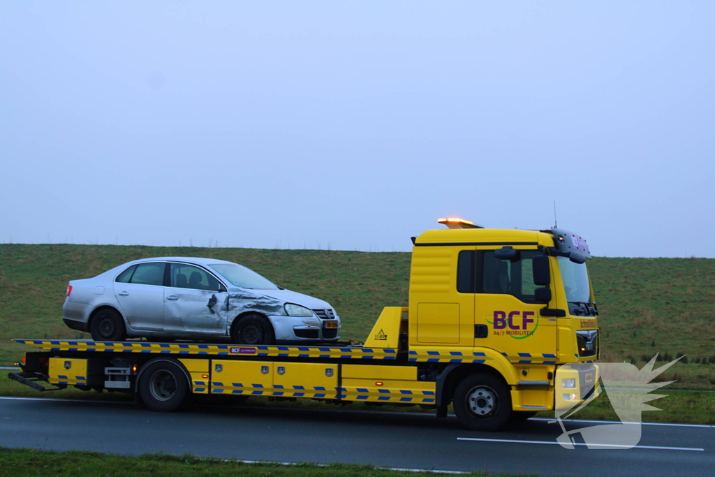 File na aanrijding tussen twee voertuigen