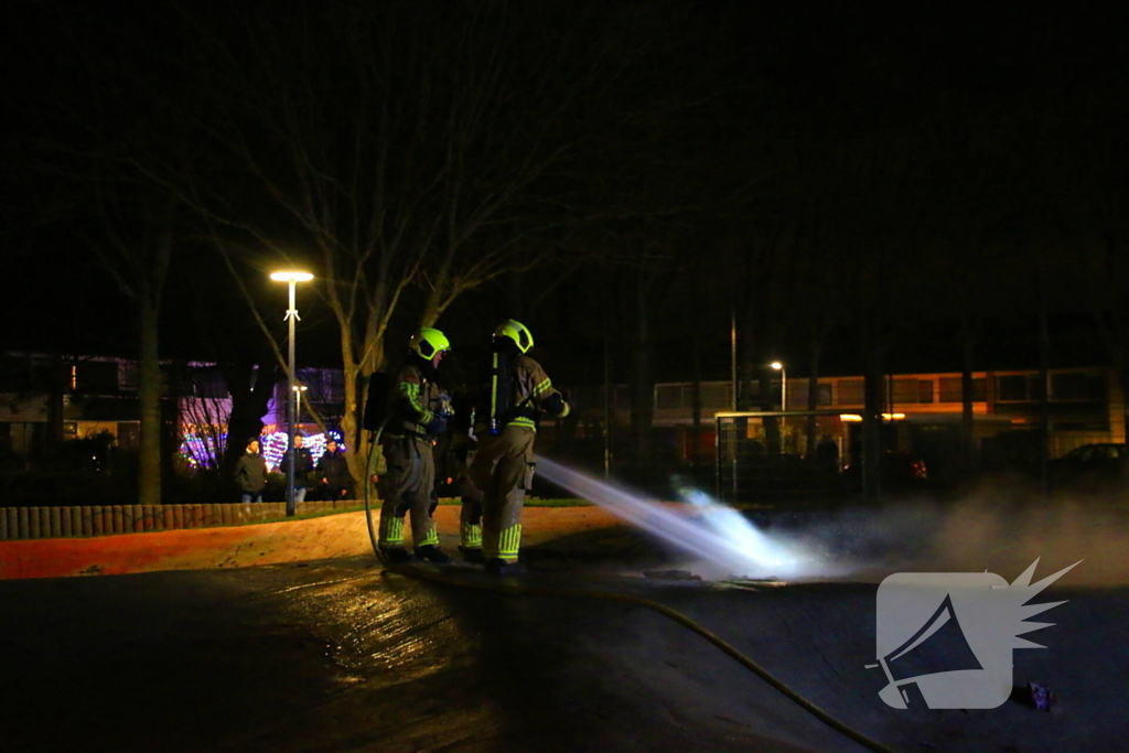 Brandweer blust kerstbomen