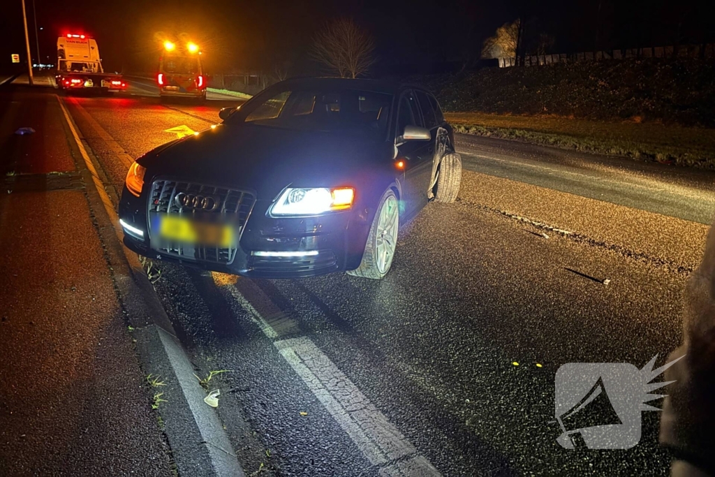 Auto in de slip bij oprit