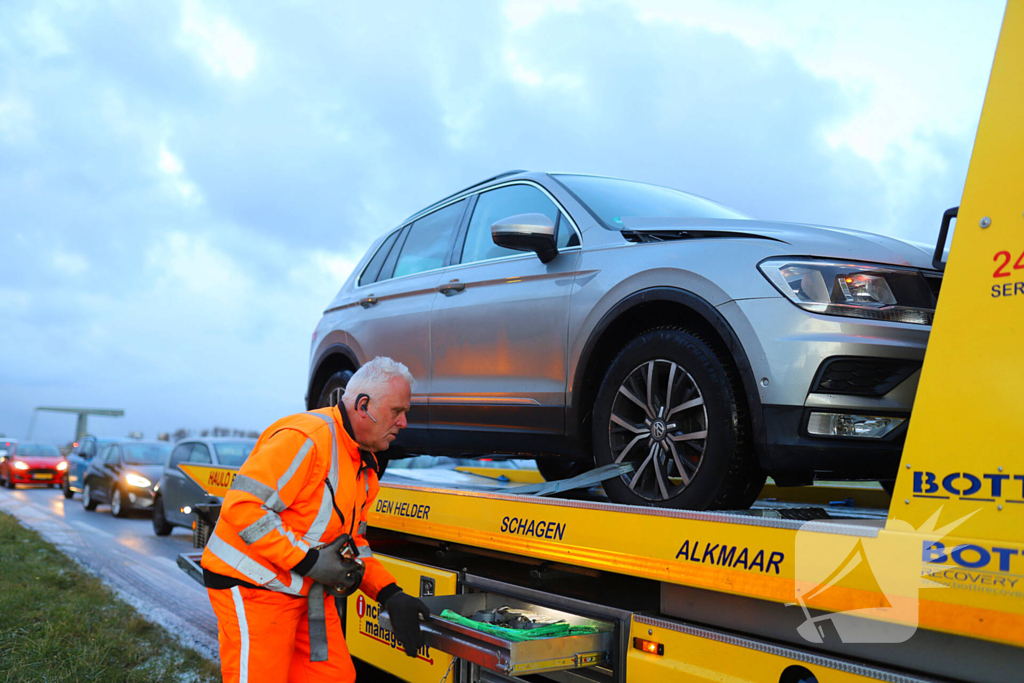 Kop-staartbotsing door glad wegdek