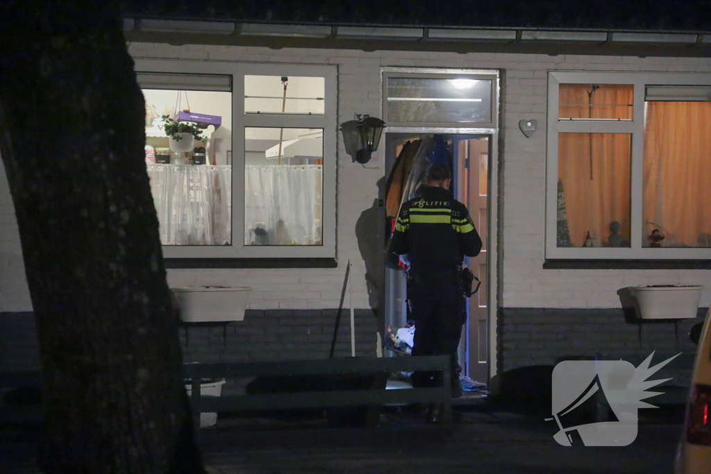 Politie doet onderzoek in woning na overval