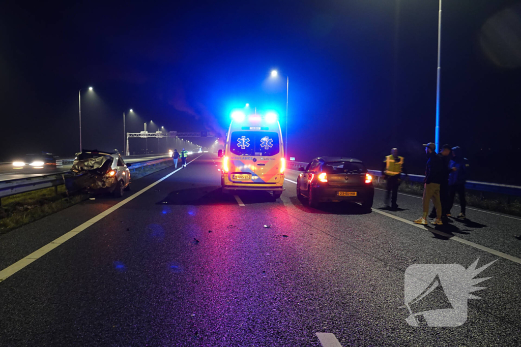 Auto var vlam na aanrijding