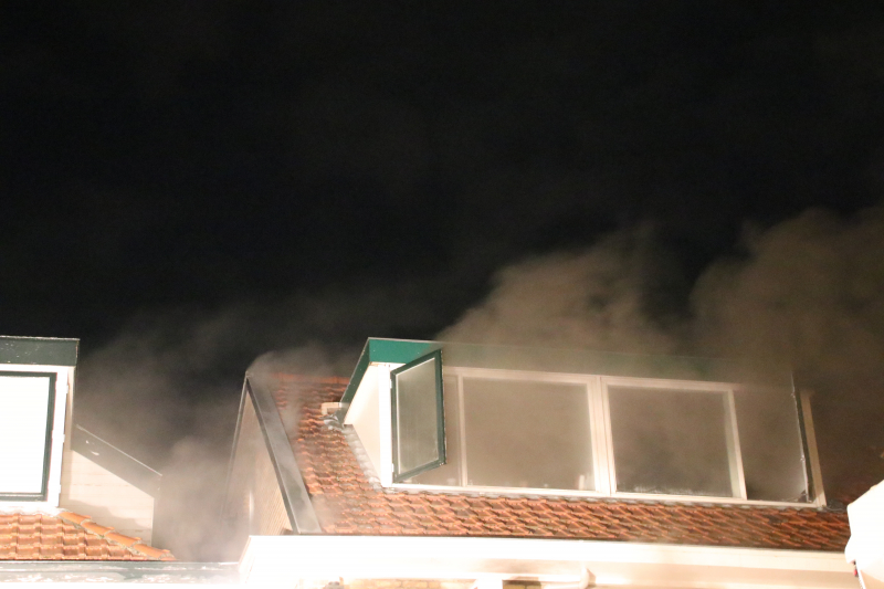 Grote schade en ravage bij winkelbrand