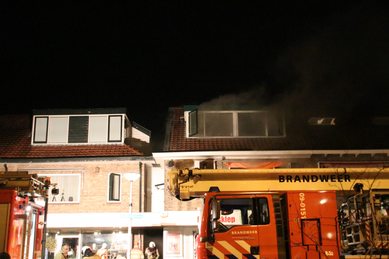 Grote schade en ravage bij winkelbrand