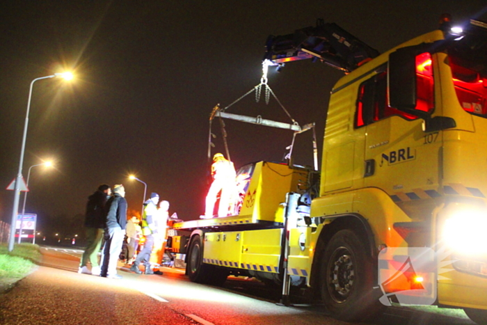 Vergeten handrem laat auto het water in rollen