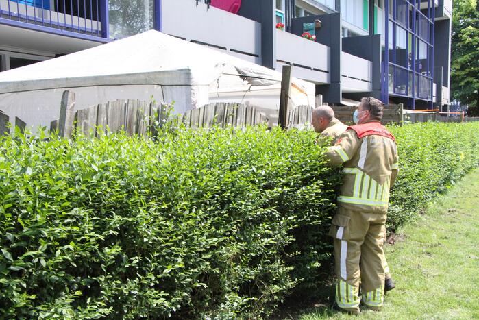 Partytent in brand door barbecue