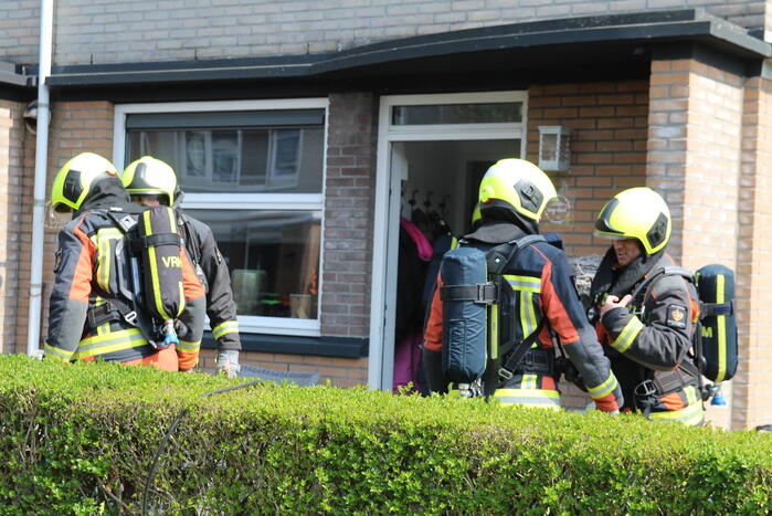 Verbrande hamburgers zetten woning vol rook