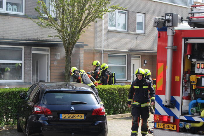 Verbrande hamburgers zetten woning vol rook