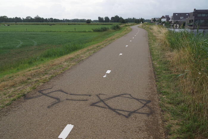 Fietspad voorzien van aanstootgevende tekeningen