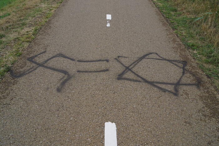 Fietspad voorzien van aanstootgevende tekeningen