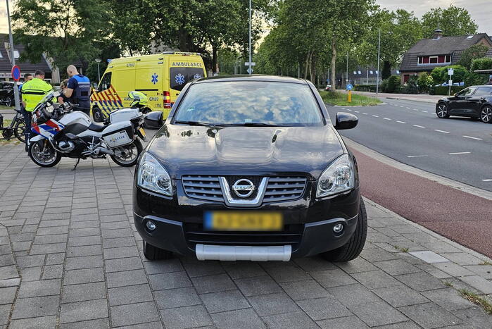 Bakfietser in botsing met personenauto