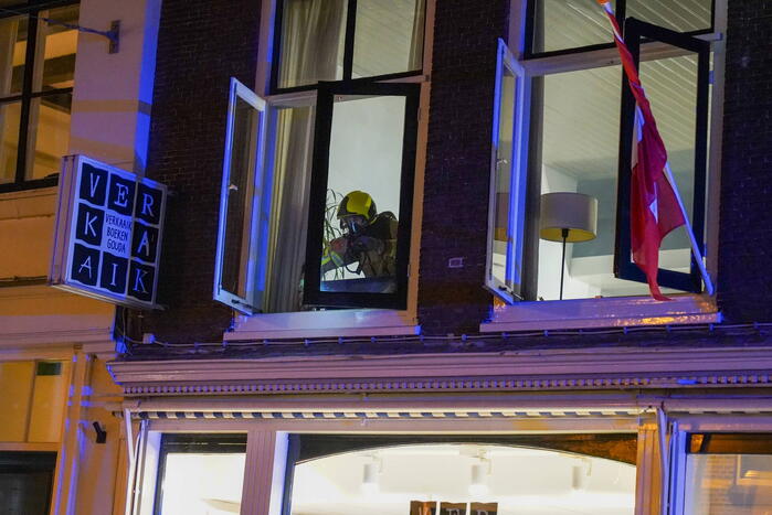 Brand in afzuigkap van woning