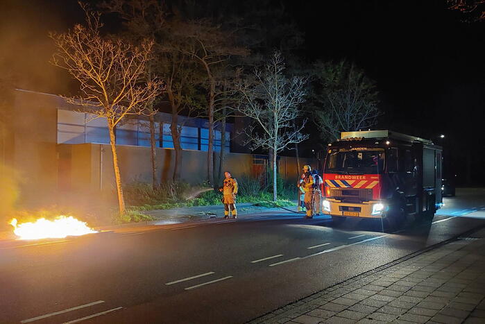 Huisvuilcontainer vat vlam