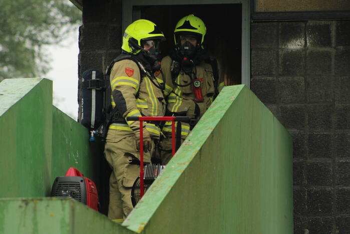 Brand in berging van flatgebouw