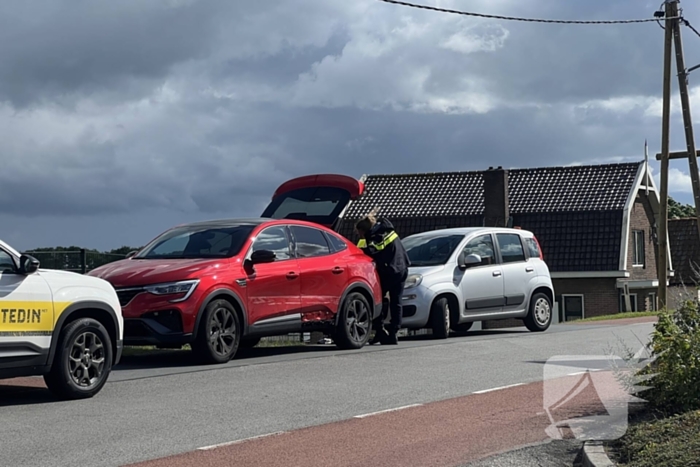 Bestuurders gecontroleerd na botsing op dijk