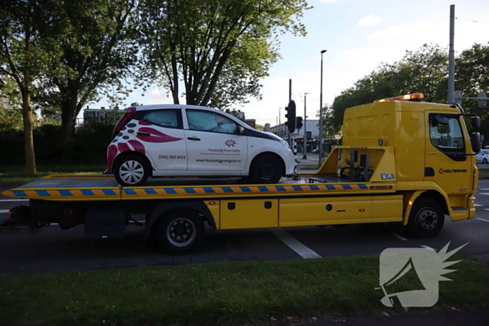 Kop-staart aanrijding voor verkeerlichten