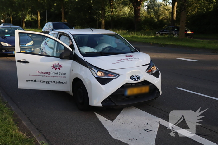 Kop-staart aanrijding voor verkeerlichten