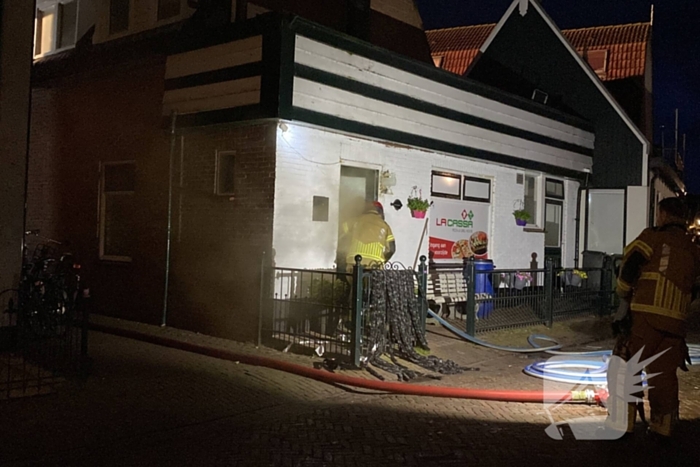 Middelbrand in pizzeria