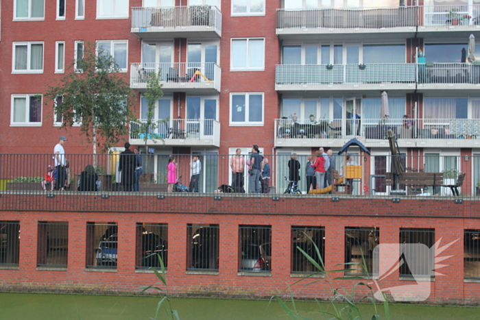 Flatgebouw ontruimd door brand in woning