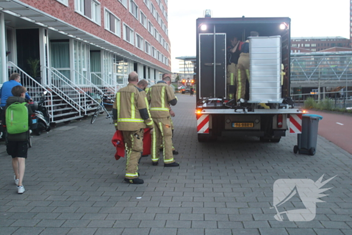 Flatgebouw ontruimd door brand in woning