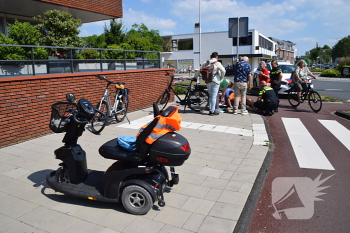 Fietsster gewond bij botsing met scootmobieler