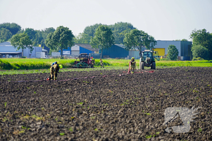 Grote rookwolken door brand in tractor