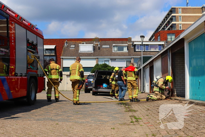 Brand in garage door laswerkzaamheden