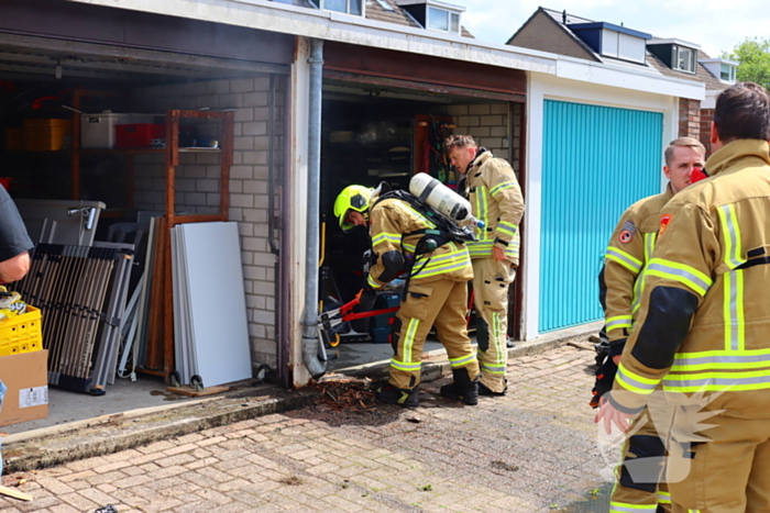 Brand in garage door laswerkzaamheden