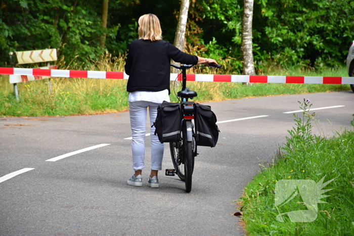 Gewond Persoon naast mountainbike aangetroffen op wegdek