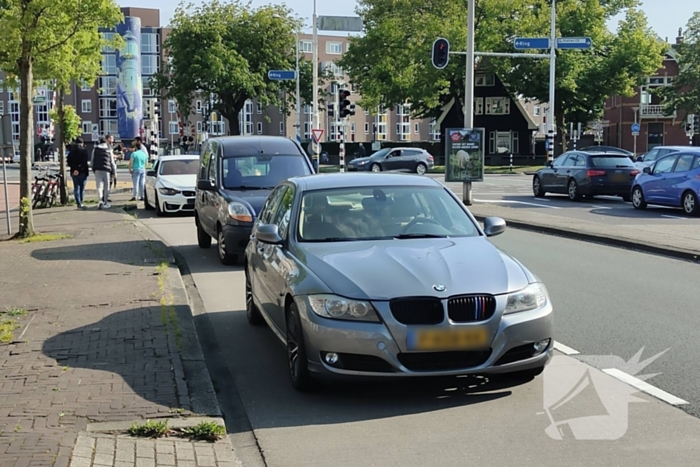 Kopstaart botsing tussen drie voertuigen