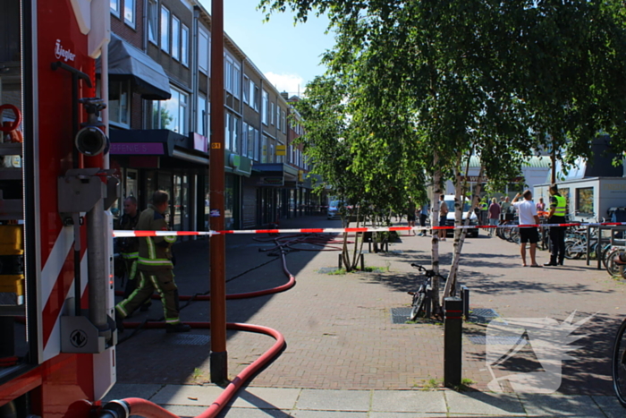 Hulpdiensten groots ingezet voor brandende werkplaats bij fietsenwinkel