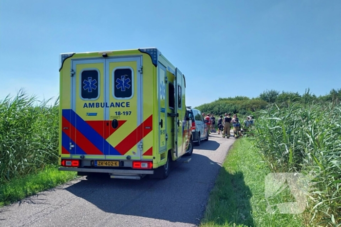 Persoon op scootmobiel belandt in water