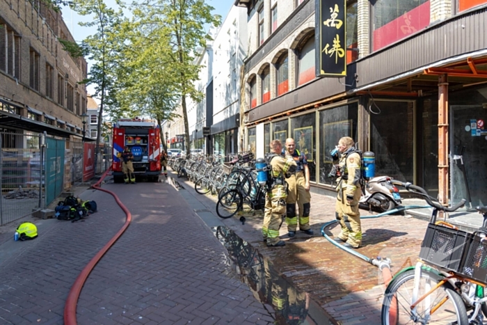 Brandende bouwmaterialen in binnenstad