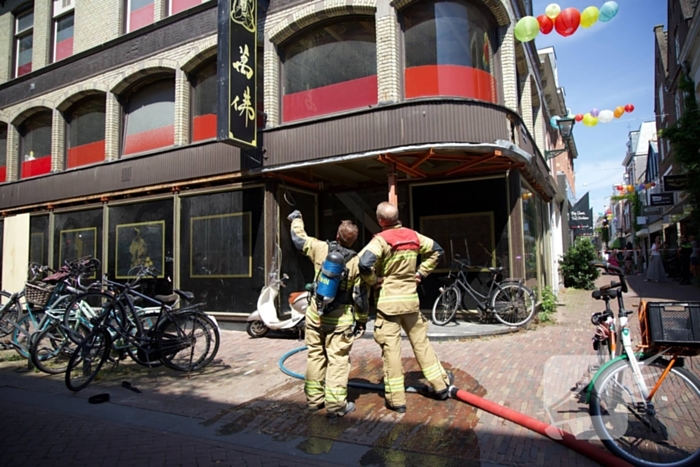 Brandende bouwmaterialen in binnenstad