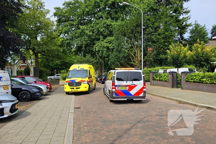 Persoon op scootmobiel ten val