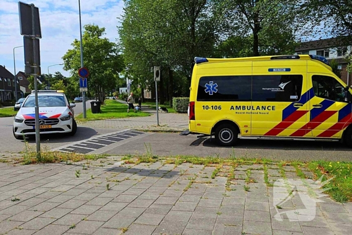 Ongeval letsel fietser botst tegen PostNL busje