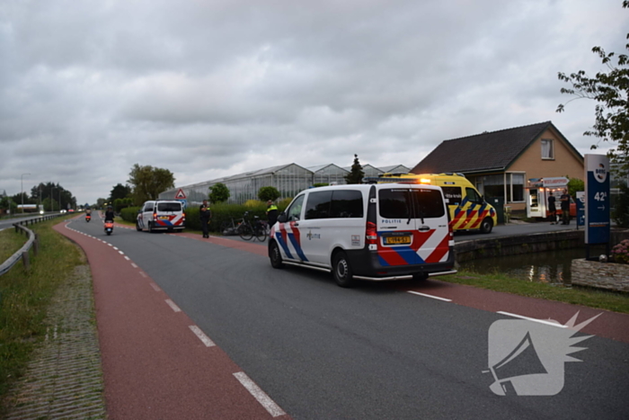 Twee fietsers komen met elkaar in botsing