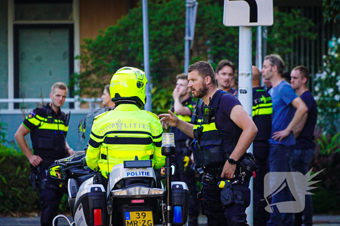 Aanhouding bij inval en onderzoek naar incident bij flat