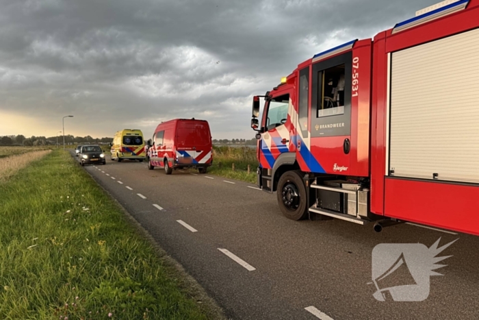 Persoon valt van fiets door wind