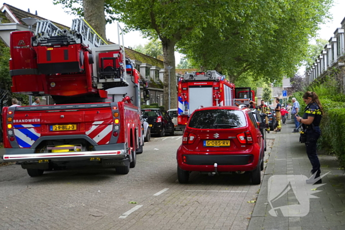 Persoon ademt rook in bij keukenbrand