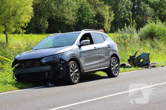 Flinke schade bij ongeval tussen dienstvoertuig en personenauto