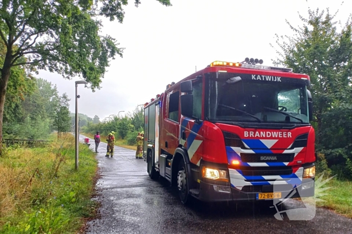 Flitsbezorger ontdekt rokende hooistapel