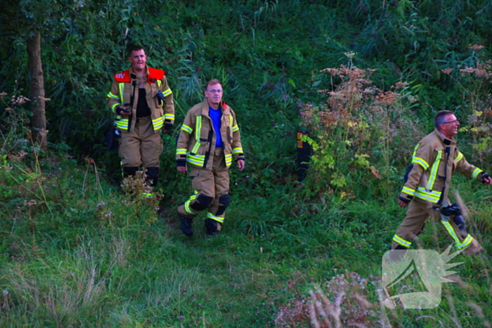 Brandweer blust buitenbrand