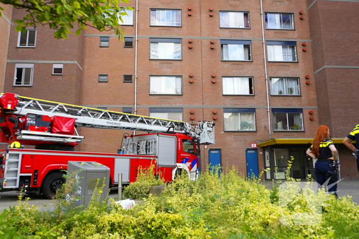 Rookontwikkeling op vijfde verdieping door keukenbrand