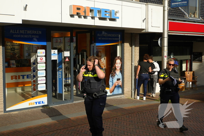 Overval op telefoonwinkel daders dreigen met vuurwapen